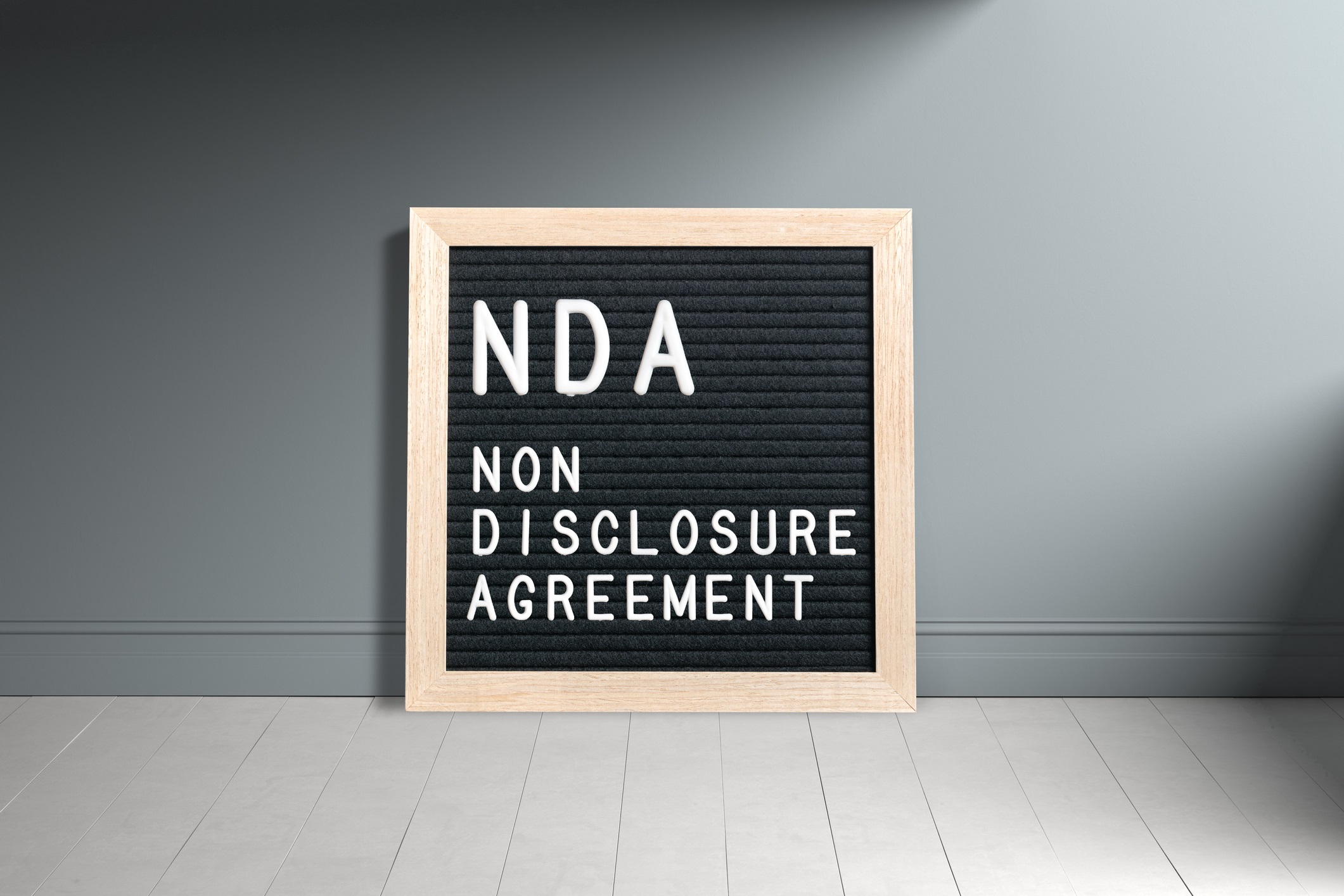 Letterboard with acronym NDA for "non disclosure agreement"